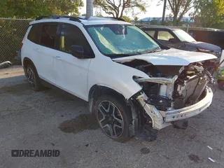 2023 Honda Passport Elite z VIN 5FNYF8H00PB027778, wystawiony jako IAAI lot #41890113 z przebiegiem Nie podano mil oraz . Historia ofert i sprzedaży dostępna na DreamBid. Obrazek 1.