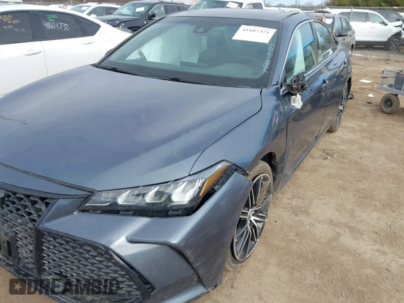 2019 Toyota Avalon XLE z VIN 4T1BZ1FB3KU024135, wystawiony jako IAAI lot #41887321 z przebiegiem 80 547 mil mil oraz . Historia ofert i sprzedaży dostępna na DreamBid. Obrazek 6.