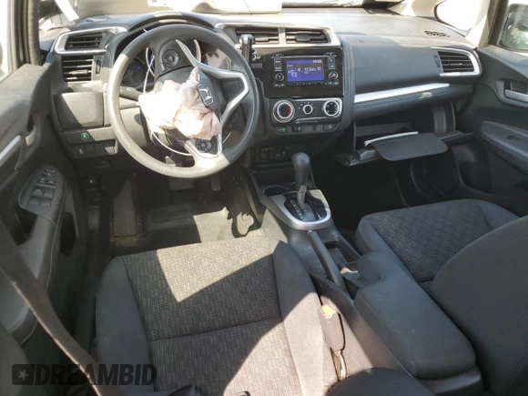 2015 Honda Fit LX с VIN 3HGGK5H59FM757797, выставлен на аукционе Copart как лот 58615175 с пробегом 109 608 миль миль и Списание • Salvage title. История ставок и продаж доступна на DreamBid. Изображение 8.