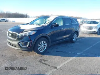 2018 Kia Sorento LX with VIN 5XYPG4A34JG431818, listed as a IAAI auction lot 40997995 with 141,886 mi miles. Bid and sale history available at carsss.com. Image 2.