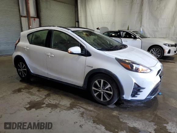 2018 Toyota Prius One with VIN JTDKDTB33J1612971, listed as a Copart auction lot 52892315 with 57,369 mi miles and Clean Title. Bid and sale history available at DreamBid. Image 4.