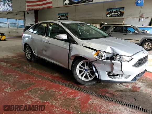 2018 Ford Focus SE with VIN 1FADP3F23JL214008, listed as a Copart auction lot 59692045 with 57,247 mi miles and Salvage title. Bid and sale history available at DreamBid. Image 4.