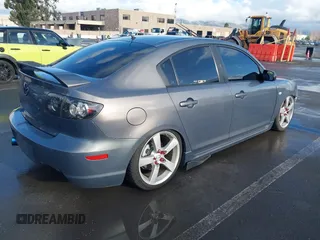 2007 Mazda 3 S Touring with VIN JM1BK324571711878, listed as a IAAI auction lot 41263973 with 158,934 mi miles and . Bid and sale history available at DreamBid. Image 4.