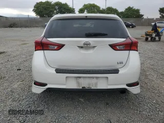 2016 Scion iM z VIN JTNKARJE5GJ516391, wystawiony jako Copart lot #58365715 z przebiegiem 89 399 mil mil oraz Szkoda całkowita • Salvage title. Historia ofert i sprzedaży dostępna na DreamBid. Obrazek 6.
