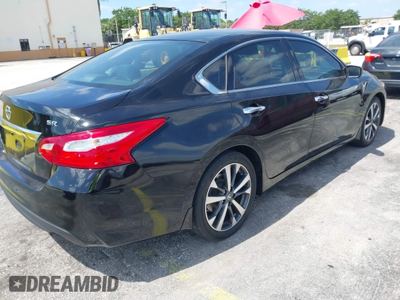2016 Nissan Altima SR with VIN 1N4AL3AP4GC289147, listed as a IAAI auction lot 42159067 with 105,112 mi miles and . Bid and sale history available at carsss.com. Image 4.