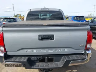 2020 Toyota Tacoma SR5 with VIN 5TFAZ5CN6LX089275, listed as a IAAI auction lot 41987526 with 51,661 mi miles and . Bid and sale history available at DreamBid. Image 17.