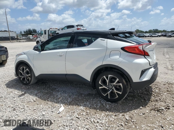 2019 Toyota C-HR XLE with VIN NMTKHMBX4KR100572, listed as a Copart auction lot 54371845 with 42,917 mi miles and Salvage Title. Bid and sale history available at DreamBid. Image 2.