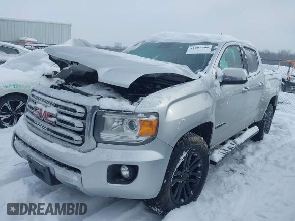2015 GMC Canyon 4WD SLT with VIN 1GTG6CE36F1257975, listed as a IAAI auction lot 41607688 with 127,523 mi miles. Bid and sale history available at carsss.com. Image 2.