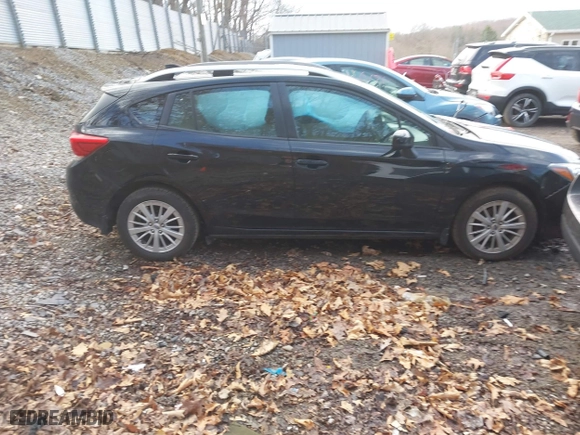 2017 Subaru Impreza Premium with VIN 4S3GTAB69H3704625, listed as a IAAI auction lot 41864611 with 71,352 mi miles. Bid and sale history available at carsss.com. Image 14.