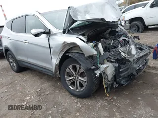 2014 Hyundai Santa Fe Sport with VIN 5XYZTDLB9EG133487, listed as a IAAI auction lot 40786642 with 137,895 mi miles. Bid and sale history available at carsss.com. Image 1.