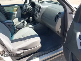 2005 Ford Escape XLT with VIN 1FMYU931X5KB49605, listed as a IAAI auction lot 42162371 with 153,816 mi miles and . Bid and sale history available at DreamBid. Image 5.