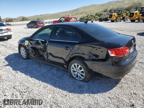 2013 Volkswagen Jetta SE with VIN 3VWDP7AJ0DM369292, listed as a Copart auction lot 55896375 with 94,887 mi miles and Salvage title. Bid and sale history available at DreamBid. Image 2.