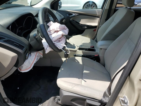2018 Ford Focus SE z VIN 1FADP3F23JL303948, wystawiony jako Copart lot #55698915 z przebiegiem 85 500 mil mil oraz Szkoda całkowita • Salvage title. Historia ofert i sprzedaży dostępna na DreamBid. Obrazek 7.