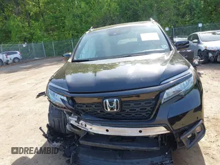 2021 Honda Passport Touring z VIN 5FNYF8H96MB014947, wystawiony jako IAAI lot #42150399 z przebiegiem 47 499 mil mil oraz . Historia ofert i sprzedaży dostępna na DreamBid. Obrazek 12.