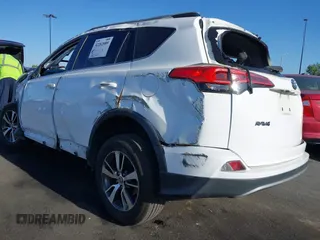 2018 Toyota RAV4 XLE with VIN 2T3WFREV3JW484955, listed as a IAAI auction lot 42262089 with 118,527 mi miles and . Bid and sale history available at DreamBid. Image 3.