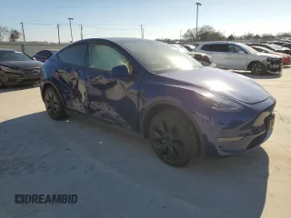 2024 Tesla Model Y with VIN 7SAYGDED8RF132720, listed as a Copart auction lot 45631755 with Not Provided miles and Salvage Title. Bid and sale history available at DreamBid. Image 4.