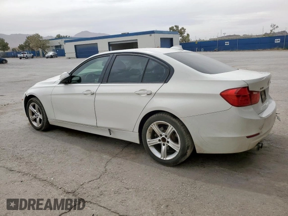 2013 BMW 3 Series 328i xDrive with VIN WBA3B3C51DF540084, listed as a Copart auction lot 56930105 with 117,567 mi miles and Salvage title. Bid and sale history available at DreamBid. Image 2.
