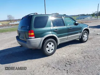 2001 Ford Escape XLT with VIN 1FMCU04161KC38571, listed as a IAAI auction lot 41881685 with 175,432 mi miles and . Bid and sale history available at DreamBid. Image 4.