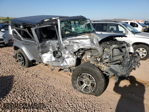 2015 Jeep Wrangler Unlimited Sahara z VIN 1C4BJWEG1FL617428, wystawiony jako Copart lot #55850005 z przebiegiem Nie podano mil oraz Szkoda całkowita • Salvage title. Historia ofert i sprzedaży dostępna na DreamBid. Obrazek 4.