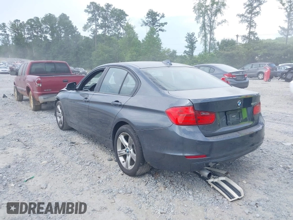 2013 BMW 3 Series 320i with VIN WBA3B1C54DF462873, listed as a IAAI auction lot 39931225 with 118,917 mi miles and . Bid and sale history available at DreamBid. Image 3.