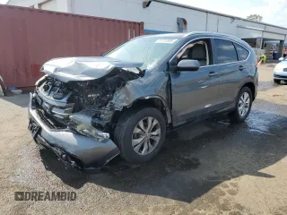 2012 Honda CR-V EX-L with VIN 2HKRM4H71CH610789, listed as a Copart auction lot 61734885 with 87,947 mi miles and Salvage title. Bid and sale history available at DreamBid. Image 1.