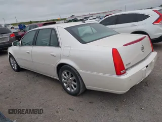 2008 Cadillac DTS 1SA z VIN 1G6KD57Y28U167974, wystawiony jako IAAI lot #40034885 z przebiegiem 116 010 mil mil oraz . Historia ofert i sprzedaży dostępna na DreamBid. Obrazek 3.