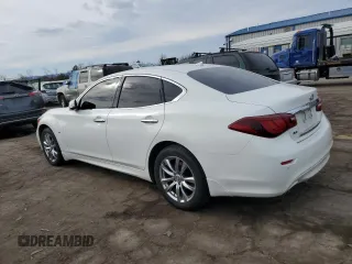 2015 Infiniti Q70 with VIN JN1BY1AR0FM561260, listed as a Copart auction lot 46496955 with 69,792 mi miles and Salvage title. Bid and sale history available at DreamBid. Image 2.