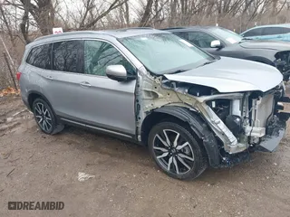 2019 Honda Pilot Touring 7-Passenger with VIN 5FNYF6H68KB050310, listed as a IAAI auction lot 41730210 with NaN miles. Bid and sale history available at carsss.com. Image 1.
