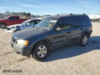 2001 Ford Escape XLT with VIN 1FMYU03171KB12159, listed as a Copart auction lot 87974165 with 0 mi miles and Salvage Title. Bid and sale history available at carsss.com. Image 1.