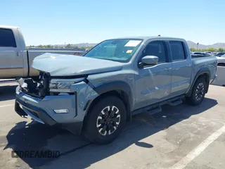 2022 Nissan Frontier SV with VIN 1N6ED1EJ3NN668626, listed as a IAAI auction lot 42127772 with 19,951 mi miles and . Bid and sale history available at DreamBid. Image 2.