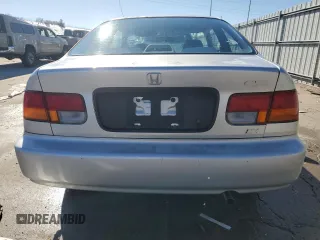 1997 Honda Civic DX with VIN 1HGEJ6127VL029010, listed as a Copart auction lot 79912244 with 268,453 mi miles and Salvage Title. Bid and sale history available at carsss.com. Image 6.