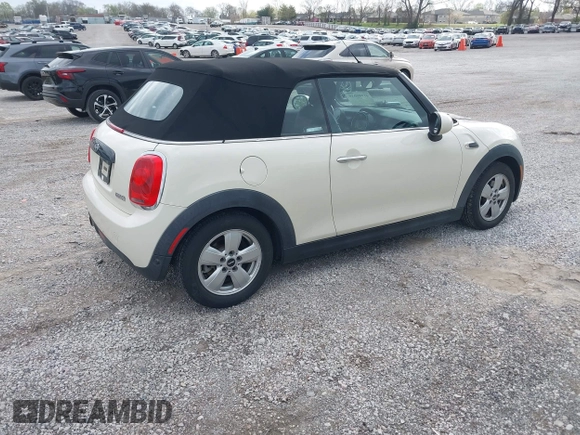 2016 MINI Convertible z VIN WMWWG5C51G3C19178, wystawiony jako IAAI lot #41909039 z przebiegiem 87 533 mil mil oraz . Historia ofert i sprzedaży dostępna na DreamBid. Obrazek 4.