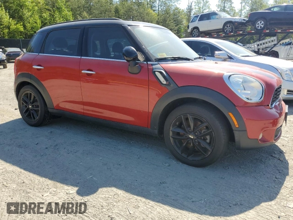 2014 MINI Countryman S with VIN WMWZC3C54EWP25321, listed as a Copart auction lot 54898515 with 48,530 mi miles and Salvage Title. Bid and sale history available at DreamBid. Image 4.