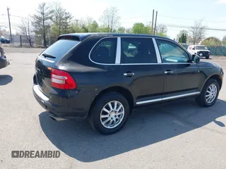 2005 Porsche Cayenne with VIN WP1AA29P25LA24897, listed as a IAAI auction lot 42125202 with 138,263 mi miles. Bid and sale history available at carsss.com. Image 4.