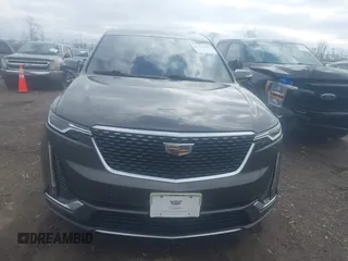 2020 Cadillac XT6 FWD Premium Luxury z VIN 1GYKPCRS0LZ136228, wystawiony jako IAAI lot #41912953 z przebiegiem Nie podano mil oraz . Historia ofert i sprzedaży dostępna na DreamBid. Obrazek 13.
