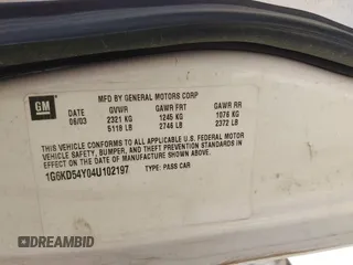 2004 Cadillac DeVille z VIN 1G6KD54Y04U102197, wystawiony jako IAAI lot #41940502 z przebiegiem Nie podano mil oraz . Historia ofert i sprzedaży dostępna na DreamBid. Obrazek 9.