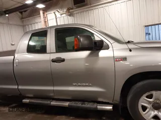 2010 Toyota Tundra 4WD Truck SR with VIN 5TFCW5F1XAX010360, listed as a IAAI auction lot 41784003 with 295,421 mi miles. Bid and sale history available at carsss.com. Image 14.