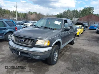 2003 Ford F-150 XLT with VIN 1FTRW08L63KA37275, listed as a IAAI auction lot 41875128 with 133,257 mi miles. Bid and sale history available at carsss.com. Image 17.