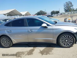 2021 Hyundai Sonata Hybrid SEL with VIN KMHL34JJ7MA026559, listed as a IAAI auction lot 41657589 with 119,019 mi miles. Bid and sale history available at carsss.com. Image 14.