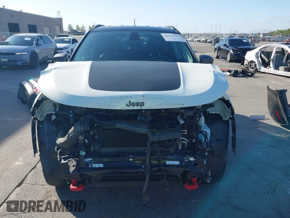 2020 Jeep Compass Trailhawk with VIN 3C4NJDDB4LT144129, listed as a IAAI auction lot 42582688 with 67,112 mi miles and . Bid and sale history available at DreamBid. Image 13.