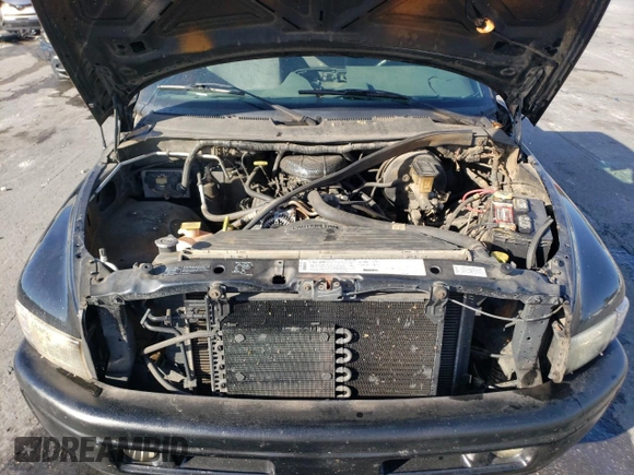 1997 Dodge 1500 z VIN 1B7HC16Z7VJ526312, wystawiony jako Copart lot #75817524 z przebiegiem 215 627 mil mil oraz Szkoda całkowita • Salvage title. Historia ofert i sprzedaży dostępna na DreamBid. Obrazek 11.