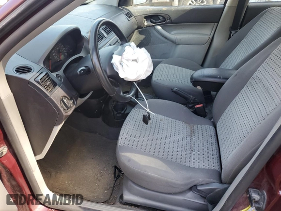 2007 Ford Focus SE with VIN 1FAFP36N87W183509, listed as a Copart auction lot 54649255 with 156,260 mi miles and Salvage title. Bid and sale history available at DreamBid. Image 7.