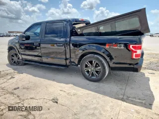 2018 Ford F-150 XL with VIN 1FTEW1E57JFC39493, listed as a Copart auction lot 61781395 with 129,871 mi miles and Salvage title. Bid and sale history available at DreamBid. Image 2.