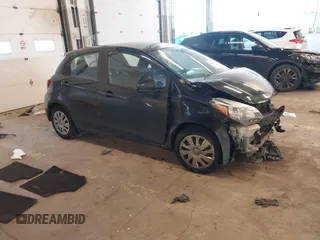 2015 Toyota Yaris L with VIN VNKKTUD32FA047472, listed as a IAAI auction lot 41674754 with 139,683 mi miles. Bid and sale history available at carsss.com. Image 1.