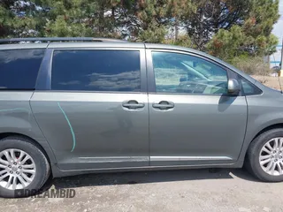 2012 Toyota Sienna XLE AAS z VIN 5TDYK3DC0CS221618, wystawiony jako IAAI lot #41983806 z przebiegiem 200 851 mil mil oraz . Historia ofert i sprzedaży dostępna na DreamBid. Obrazek 14.