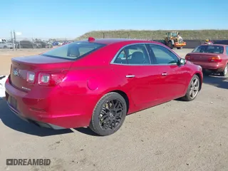 2014 Chevrolet Malibu LTZ with VIN 1G11J5SX2EF230032, listed as a IAAI auction lot 41408841 with 76,846 mi miles. Bid and sale history available at carsss.com. Image 4.
