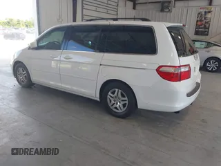 2005 Honda Odyssey EX with VIN 5FNRL38415B010150, listed as a IAAI auction lot 42844859 with 174,421 mi miles and . Bid and sale history available at DreamBid. Image 3.