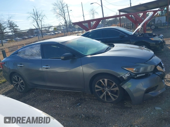 2016 Nissan Maxima Platinum with VIN 1N4AA6APXGC438961, listed as a IAAI auction lot 41535350 with 194,701 mi miles and . Bid and sale history available at DreamBid. Image 13.