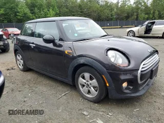 2014 MINI Hardtop with VIN WMWXM5C57ET932920, listed as a Copart auction lot 55810575 with 73,151 mi miles and Salvage title. Bid and sale history available at DreamBid. Image 4.