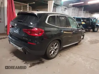 2021 BMW X3 xDrive30i with VIN 5UXTY5C09M9E77981, listed as a IAAI auction lot 41965697 with 61,723 mi miles and . Bid and sale history available at DreamBid. Image 4.